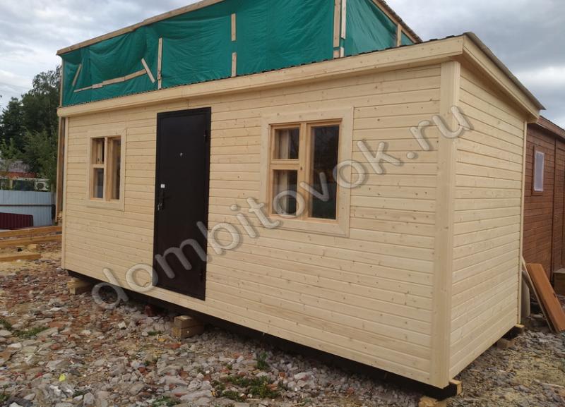 Фото бытовки дачной распашонки с железной дверью