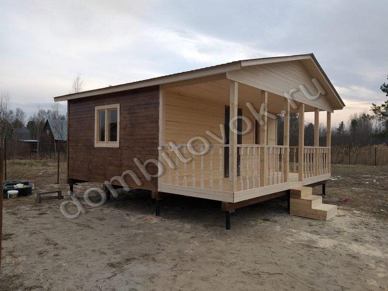 Дачный дом с террасой, санузлом и тремя комнатами фото