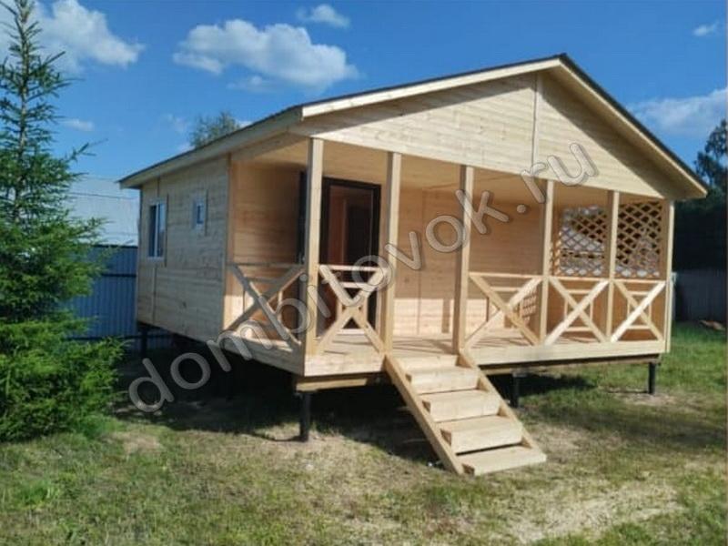 Дачный дом с террасой, санузлом и тремя комнатами фото