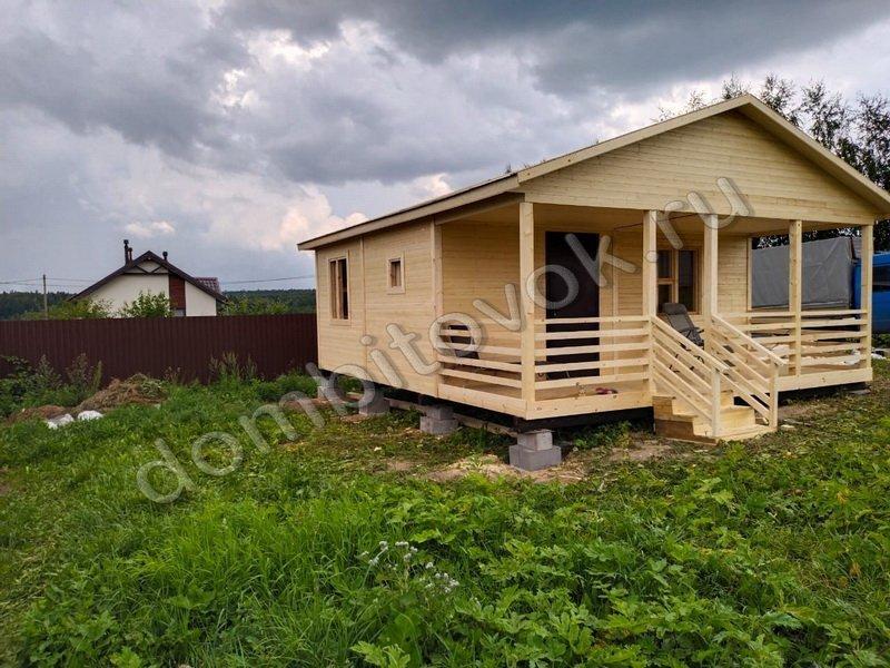 Дачный дом с террасой, санузлом и тремя комнатами фото