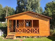 Фото дачного домика с верандой и хозяйственным помещением