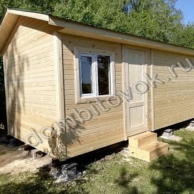 Бытовка с двухскатной крышей фото