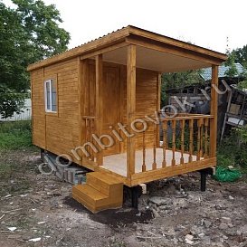 Бытовка с верандой на участке фото