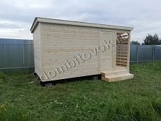 Фото хозблока с дровником для дачи