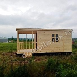 Фото бытовки с верандой вид спереди