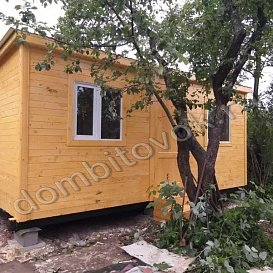 Бытовка 6х2,3м на участке фото