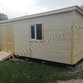 Бытовка деревянная с двумя распашными дверями фото